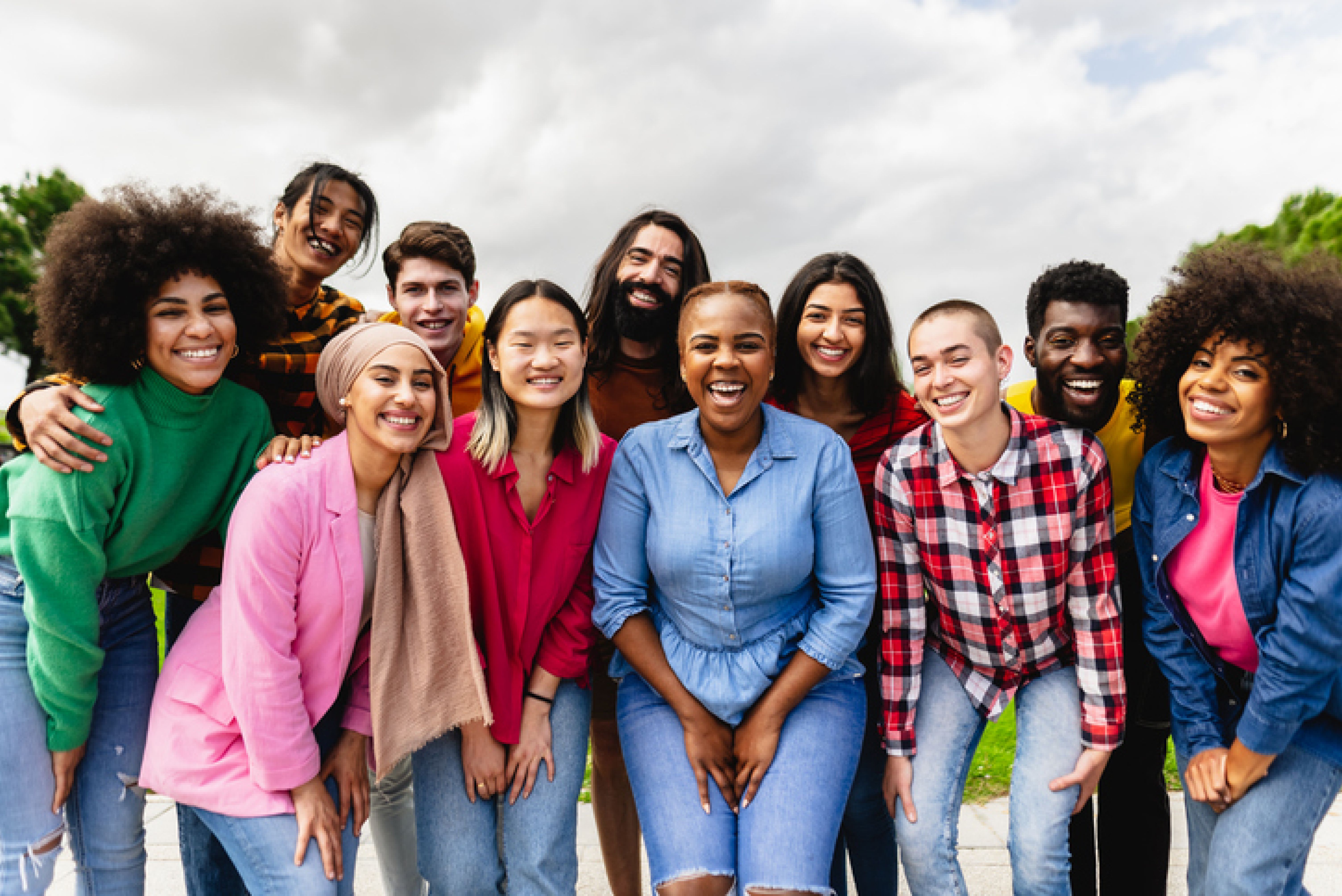 multiracial group of smiling students