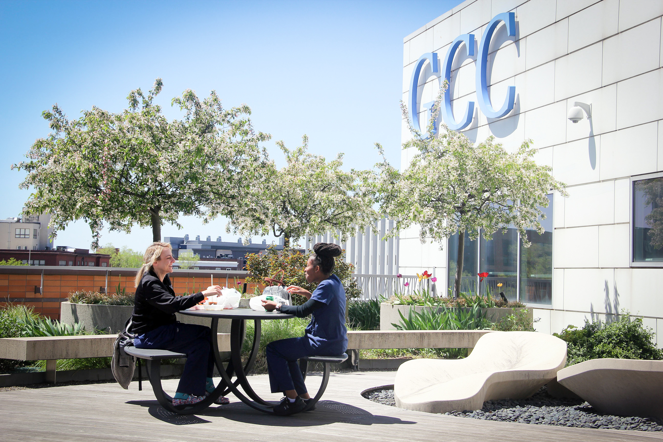 students eat together on patio