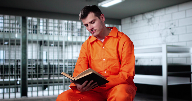 Inmate reads book