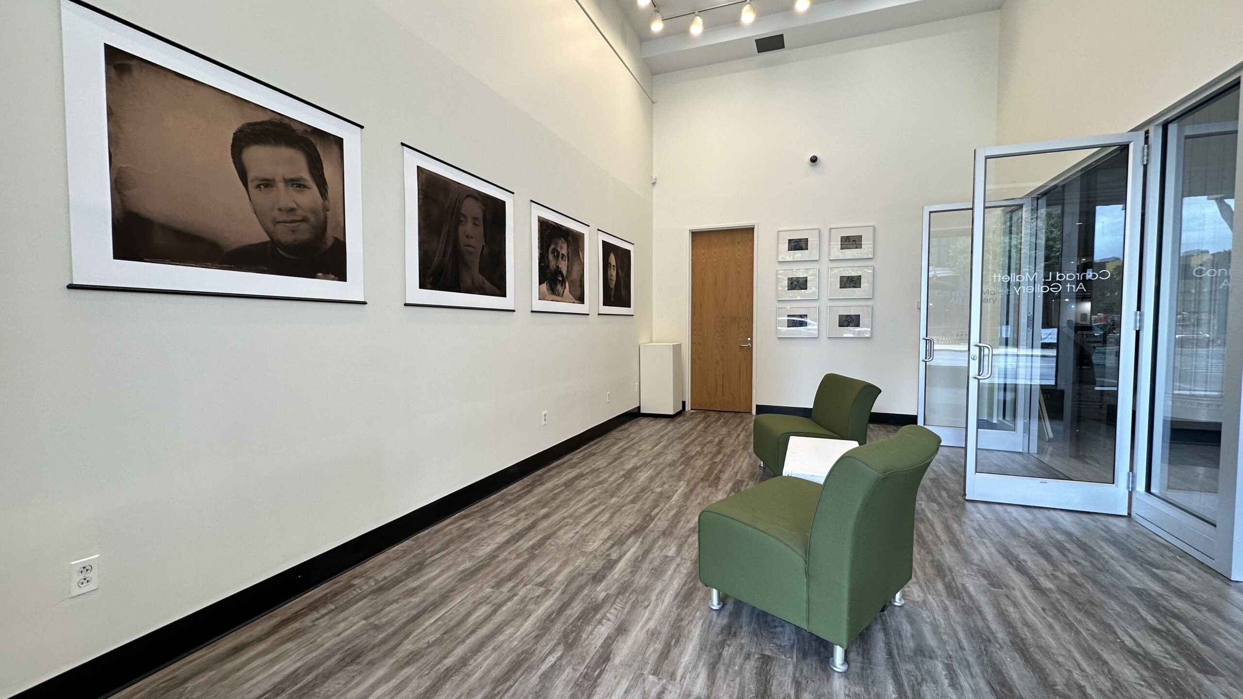 Mallett Gallery with armchairs facing artwork on walls