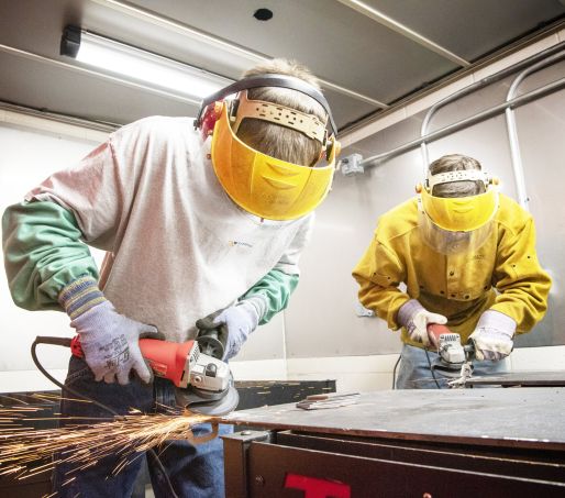 students work in welding lab