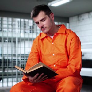 Inmate reads book