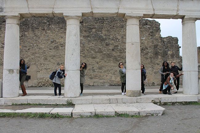 group of students in Italy in front of monument