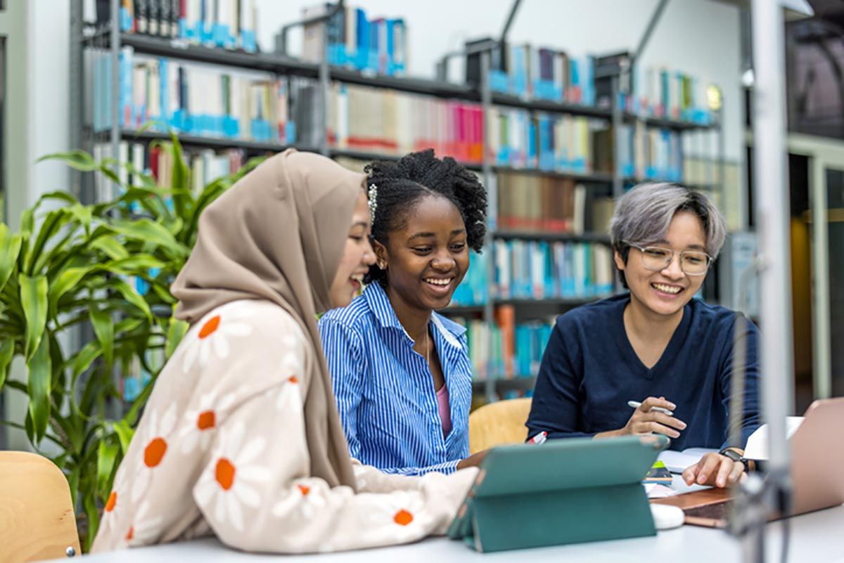 Students studying in library