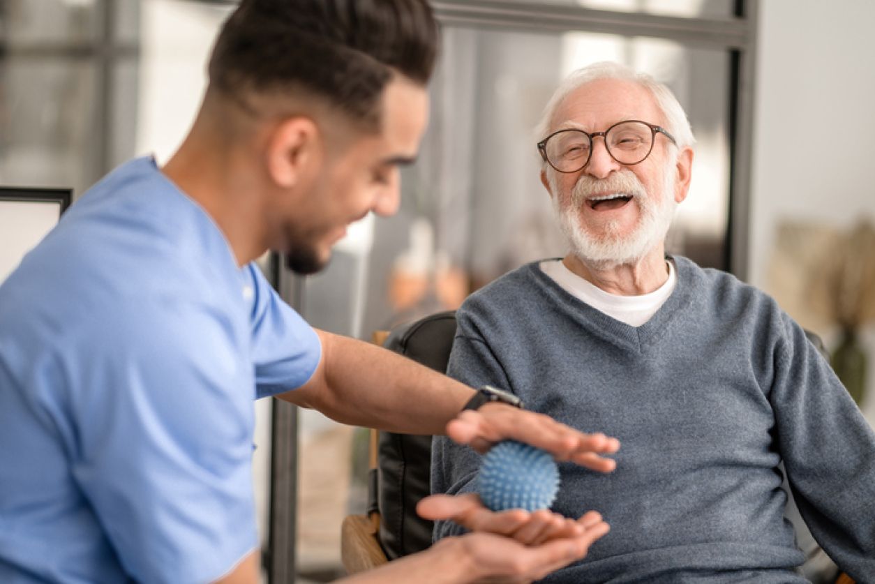 Physical therapist working with client