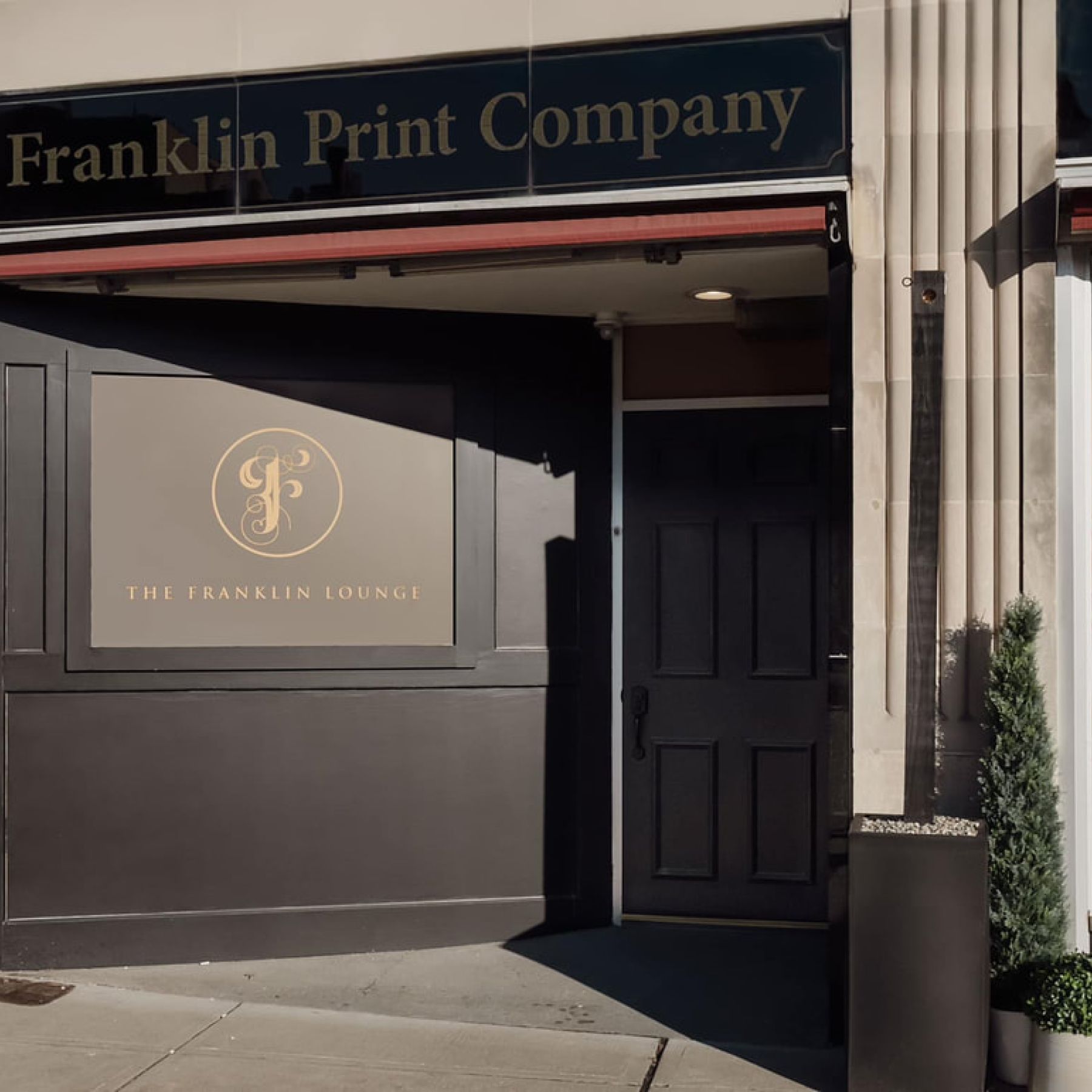 Franklin Lounge entrance. Sign reads "Franklin Print Company"