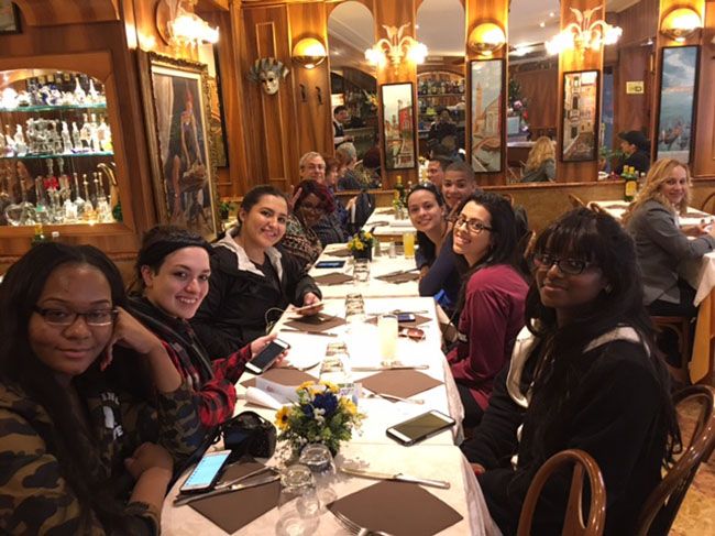 students at restaurant table