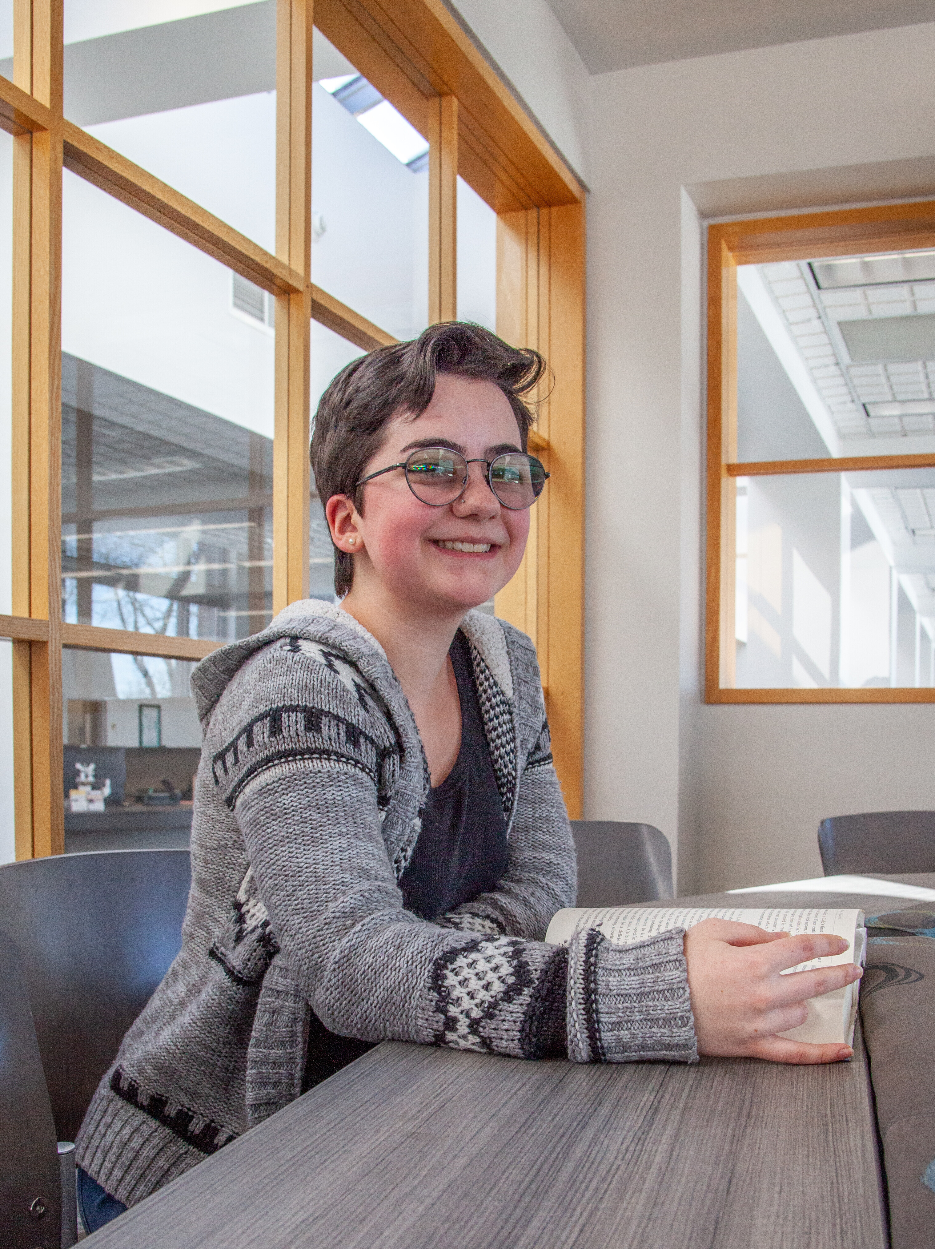 student in library