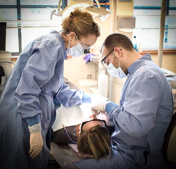 dental students work on teeth